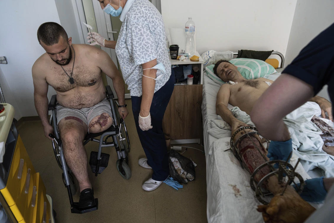 At a rehabilitation hospital in the western city of Lviv, soldiers rely as much on each other as they do upon the physicians and rehabilitation specialists they will need to adapt to their new prostheses. (AP)