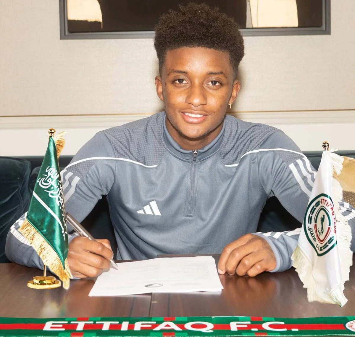The Jamaica international moved for an undisclosed fee and signed a four-year contract (Twitter/@Ettifaq_EN)
