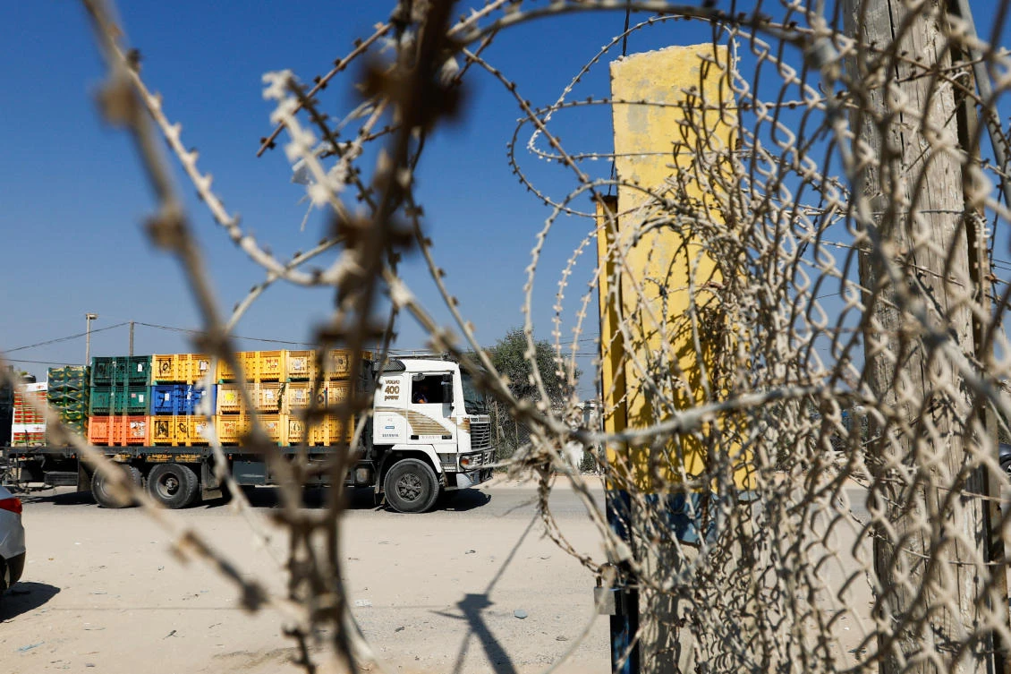 A view of Palestinian goods trucks in front of the commercial crossing of Kerem Shalom after the Israeli ban on Gaza exports deals a blow to the long-suffering economy, in Gaza Strip, Sept. 5, 2023. (Reuters)