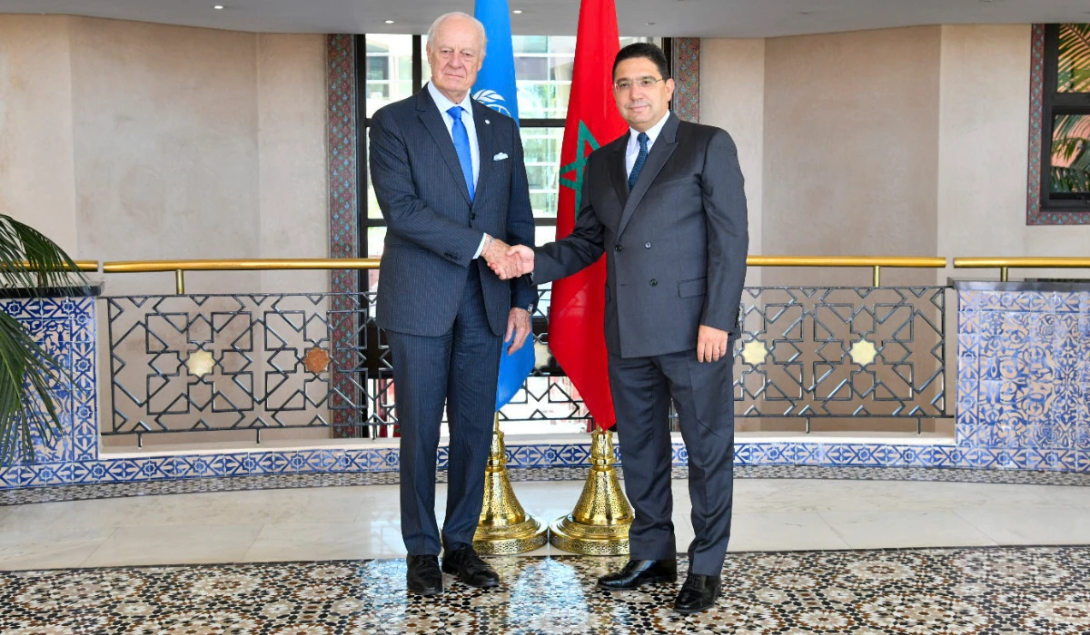 In this image released by Morocco's Foreign Ministry, Morocco's Foreign Minister Nasser Bourita, right, welcomes UN Secretary General's Personal Envoy for Western Sahara, Staffan de Mistura, as he visits the region, in Rabat, Morocco, Friday, Sept. 8, 2023. (AP)