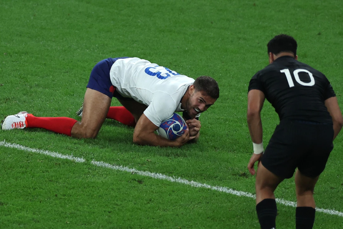 France's fullback Melvyn Jaminet scores a try during the France 2023 Rugby World Cup Pool A match between France and New Zealand at Stade de France in Saint-Denis, on the outskirts of Paris. (AFP)