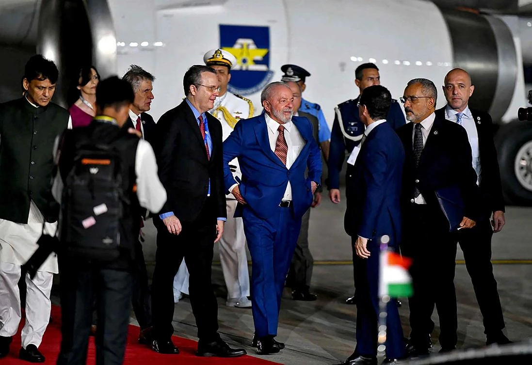 Brazil's President Luiz Inacio Lula da Silva (C) arrives at the airport on the eve of two-day G20 summit in New Delhi on September 8, 2023. (AFP)