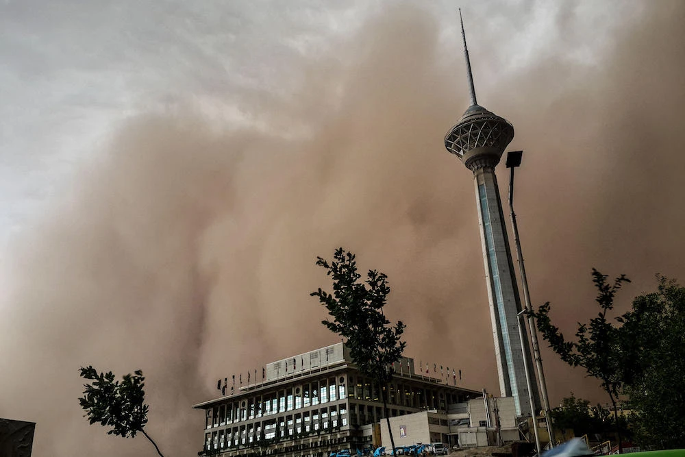 Sand and dust storms are expected to increase in the countries most vulnerable to climate change, according to meteorologists. Above, a sandstorm engulfs the Iranian capital of Tehran on June 02, 2014. (Fars News/AFP)