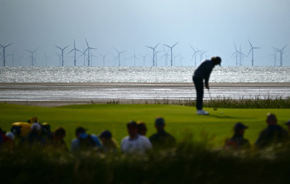 Above, wind turbines at the Burbo Bank Offshore windfarm in northwest England on July 21, 2023. (AFP)