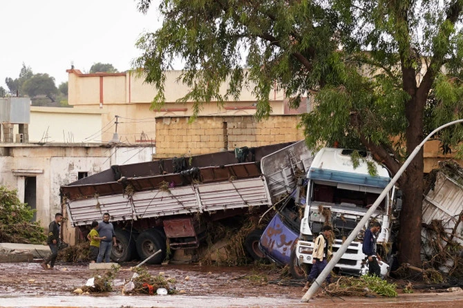 This handout picture provided by the office of Libya's Benghazi-based interim prime minister on September 11, 2023 shows a view of a trailer truck crashed into a tree in the eastern city of Benghazi in the wake of the Mediterranean storm "Daniel". (AFP)