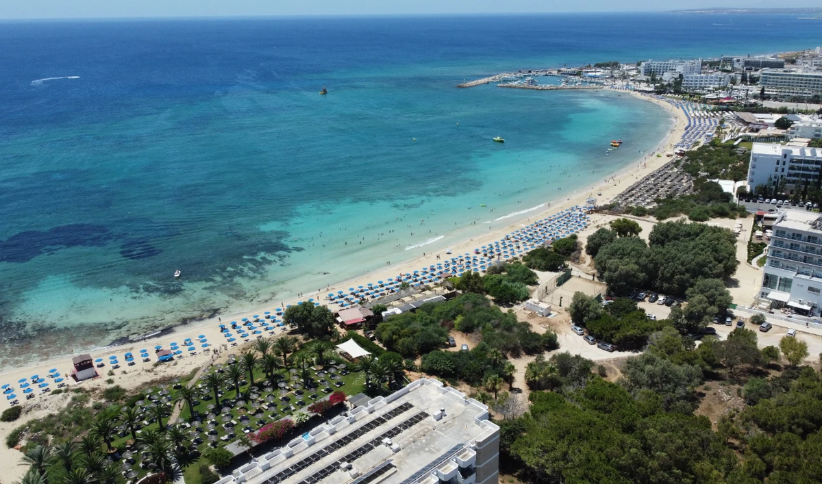 An aerial picture shows a view of hotels in the bay of the Cypriot resort town of Ayia Napa on July 21, 2022. (AFP/File)
