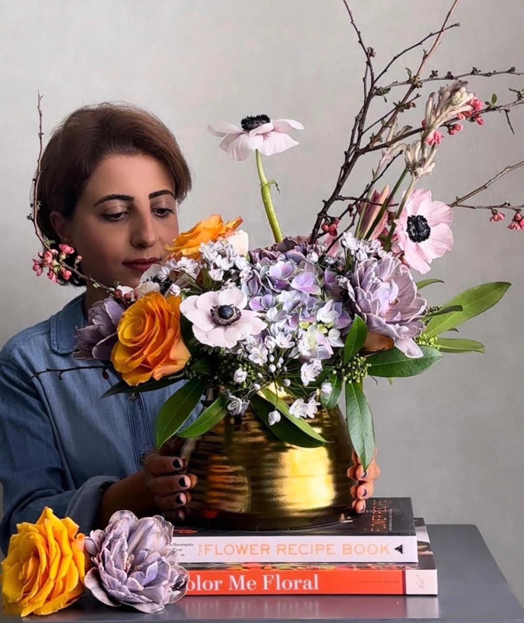 Kholod Abughazalah, a Saudi florist, gets into the zone for each of her floral arrangements by turning on her favorite music. (Supplied)