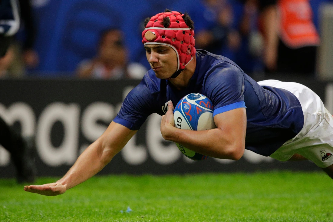France's Louis Bielle-Biarrey scores a try during the Rugby World Cup Pool A match between France and Uruguay at the Pierre Mauroy stadium in Villeneuve-d'Ascq, outside Lille. (AP)