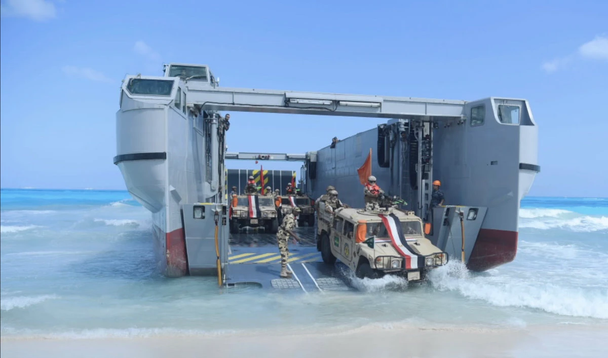 Saudi troops disembark from a landing craft during the ‘Bright Star 2023’ military exercises in Egypt. (Saudi Ministry of Defense handout / via Al-Ekhbariya)
