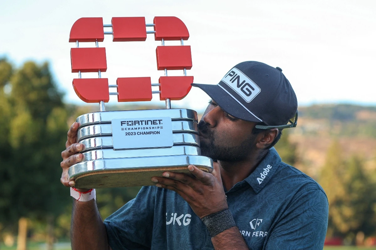 Sahith Theegala of the US celebrates with the trophy after winning during the final round of the Fortinet Championship at Silverado Resort and Spa on Sunday in Napa, California. (GETTY IMAGES NORTH AMERICA /AFP)