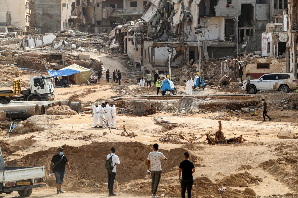 The enormous flood, fuelled by torrential rains on September 10, had broken through two upstream dams and sent a giant wave crashing down the previously dry river bed, or wadi, that bisects the city of about 100,000 people. (AFP)