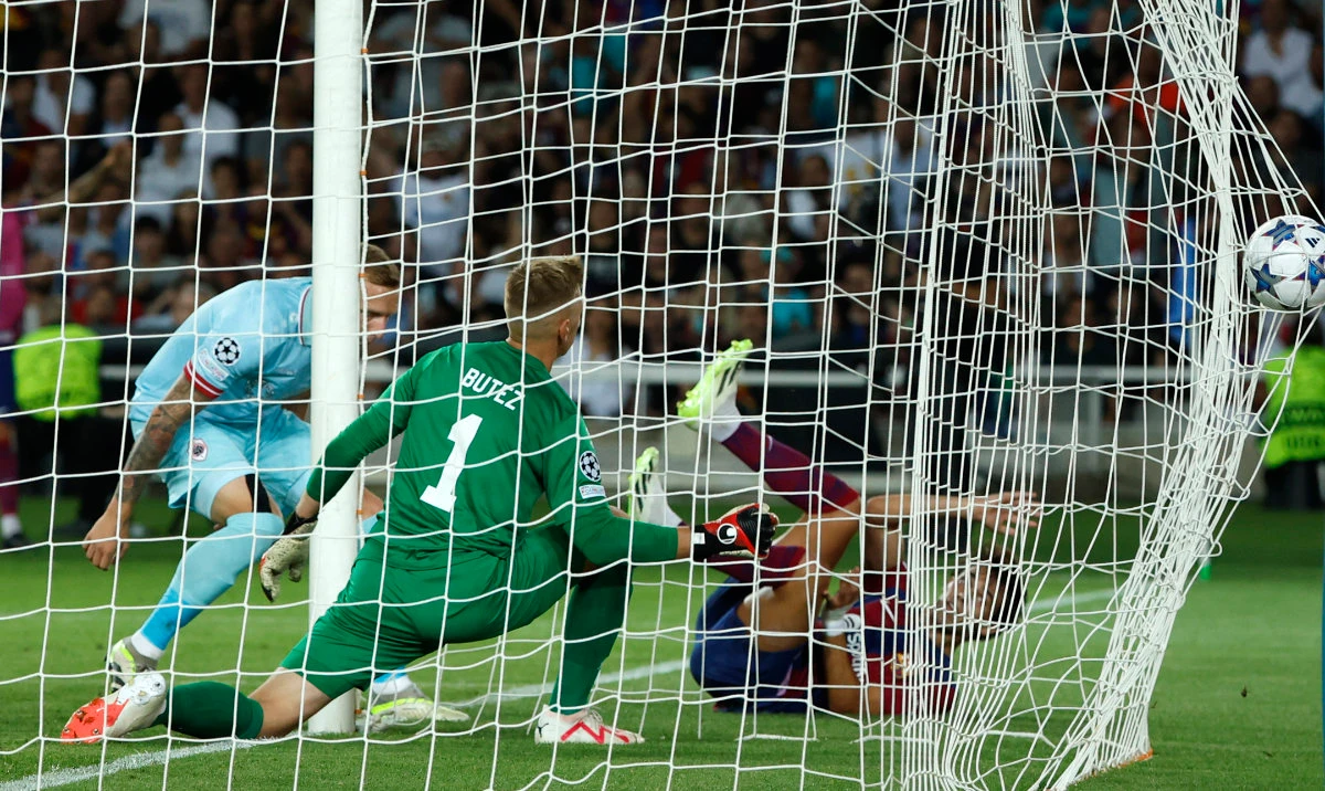 Barcelona's Joao Felix, right, scores his side's fifth goal during the Champions League Group H soccer match between Barcelona and Royal Antwerp at the Olympic Stadium of Montjuic in Barcelona Tuesday. (AP)