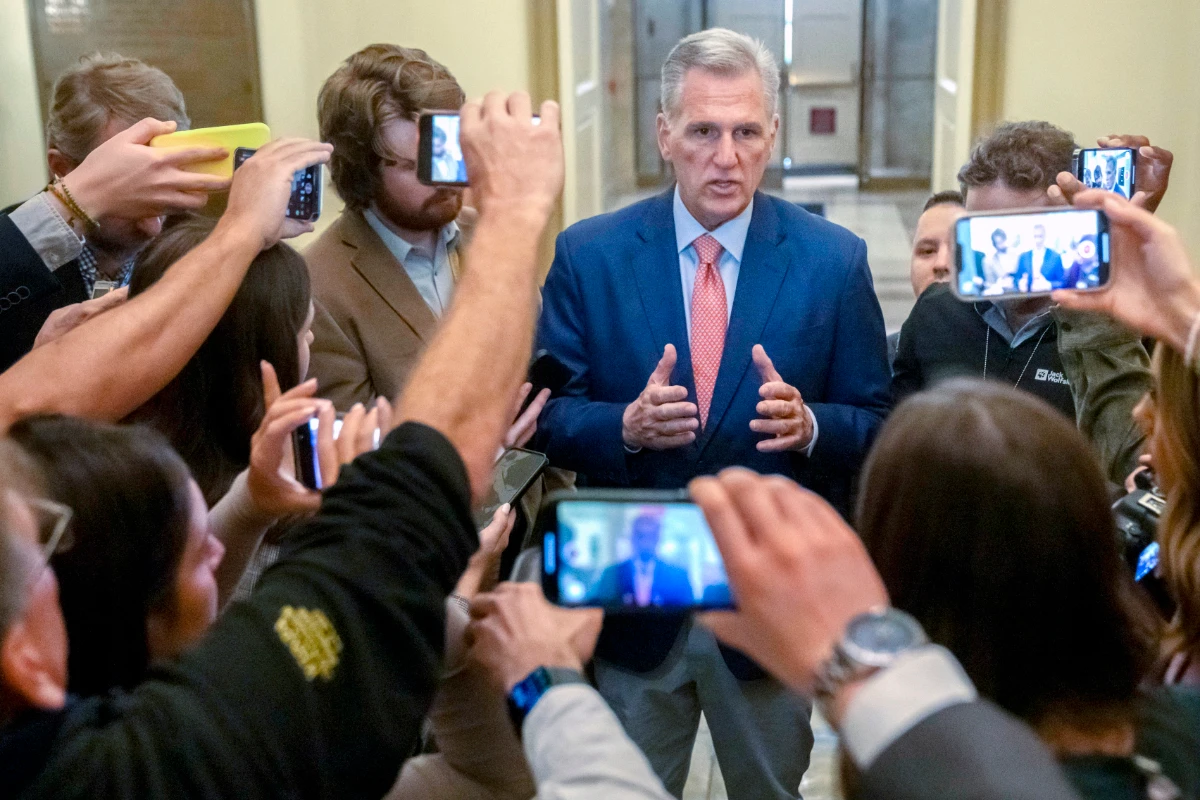 Speaker of the House Kevin McCarthy, R-Calif., is surrounded by reporters looking for updates on plans to fund the government and avert a shutdown, at the Capitol in Washington, Friday, Sept. 22, 2023. (AP)