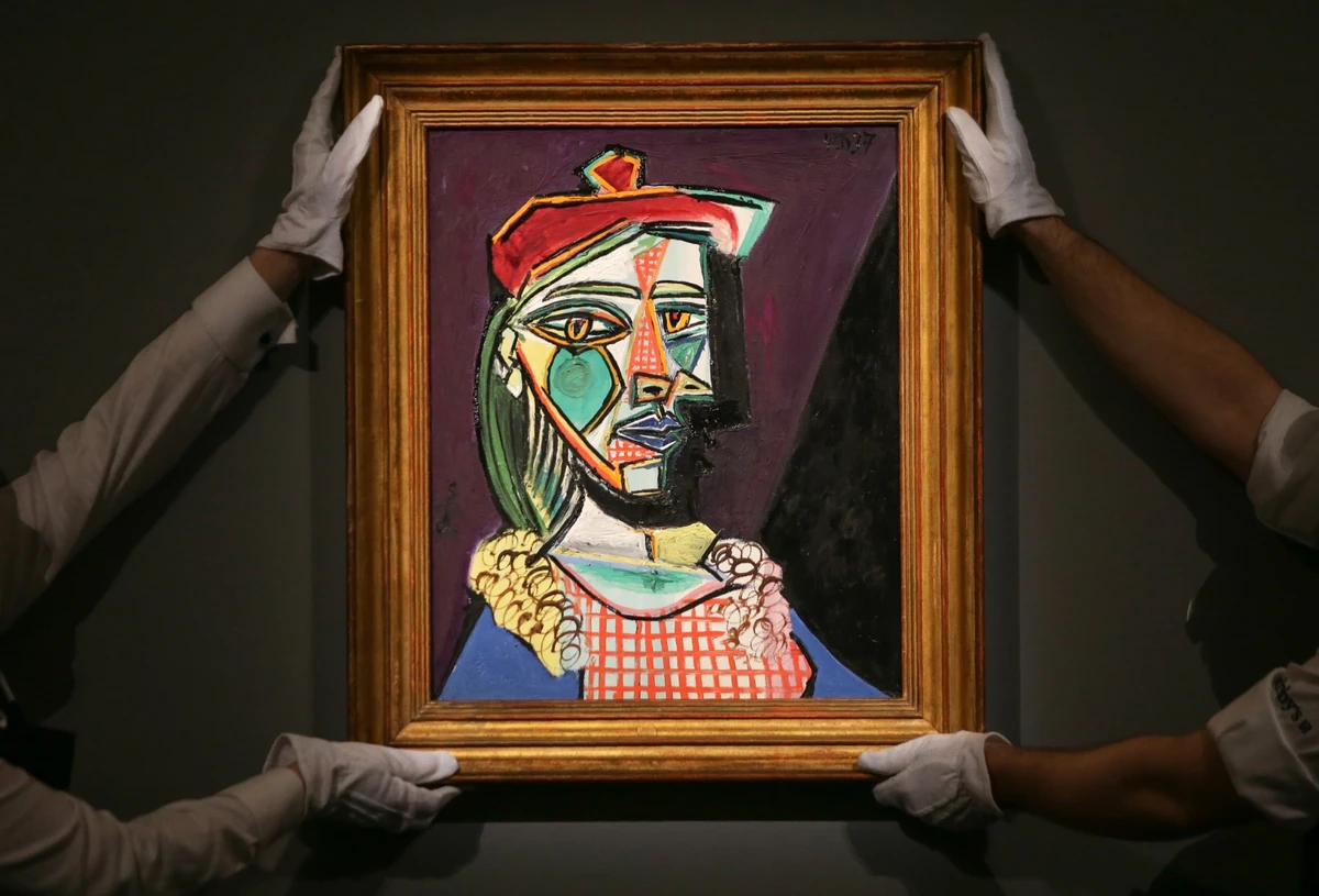 The painting titled “Femme a la montre” will be sold in November as part of a two-day auction of late New Yorker Emily Fisher Landau’s prestigious collection (AFP)