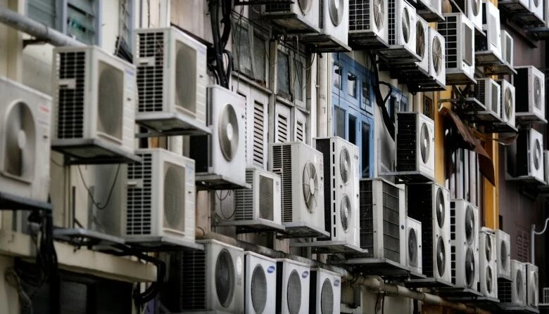 Air conditioning units on an exterior wall of a building in Singapore’s financial district, Dec. 11, 2009. (Reuters)