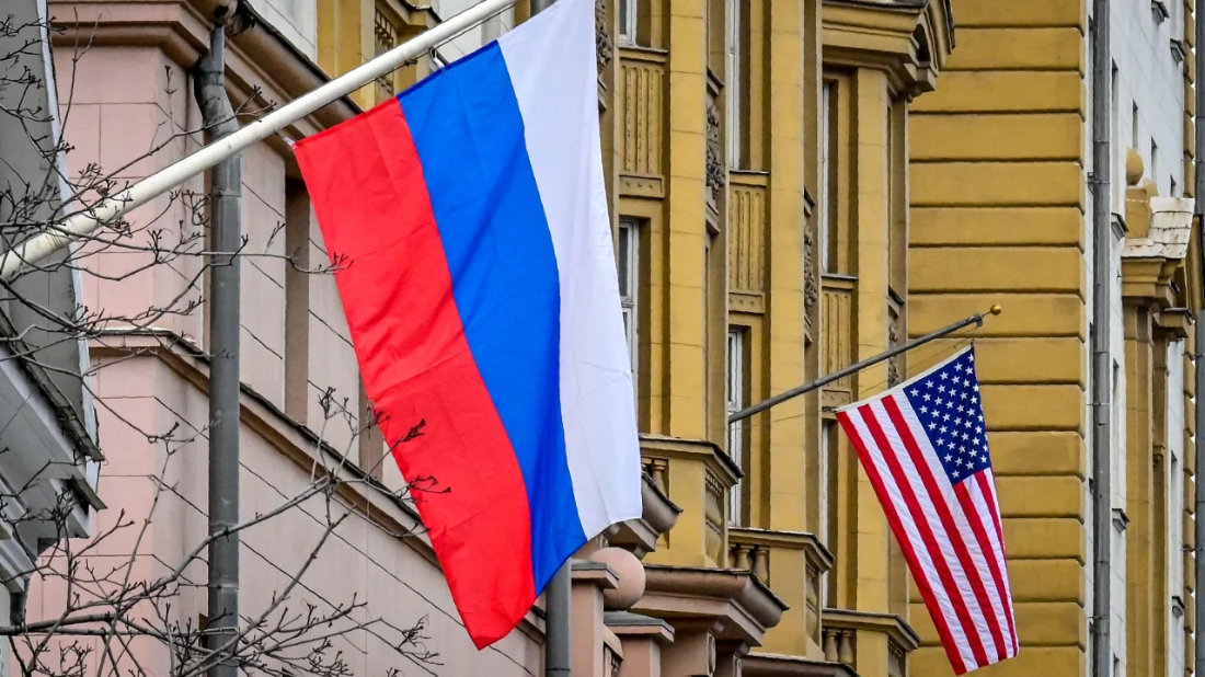 A Russian flag flies next to the US embassy building in Moscow. (AFP)