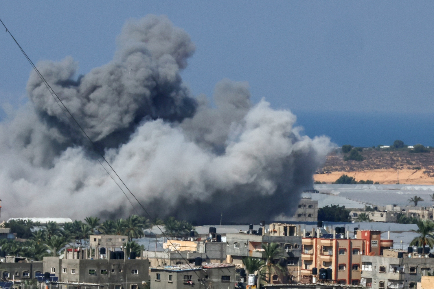 Smoke billows after an Israeli air strike in Rafah in the southern Gaza Strip. Oct. 16, 2023 (File/AFP)
