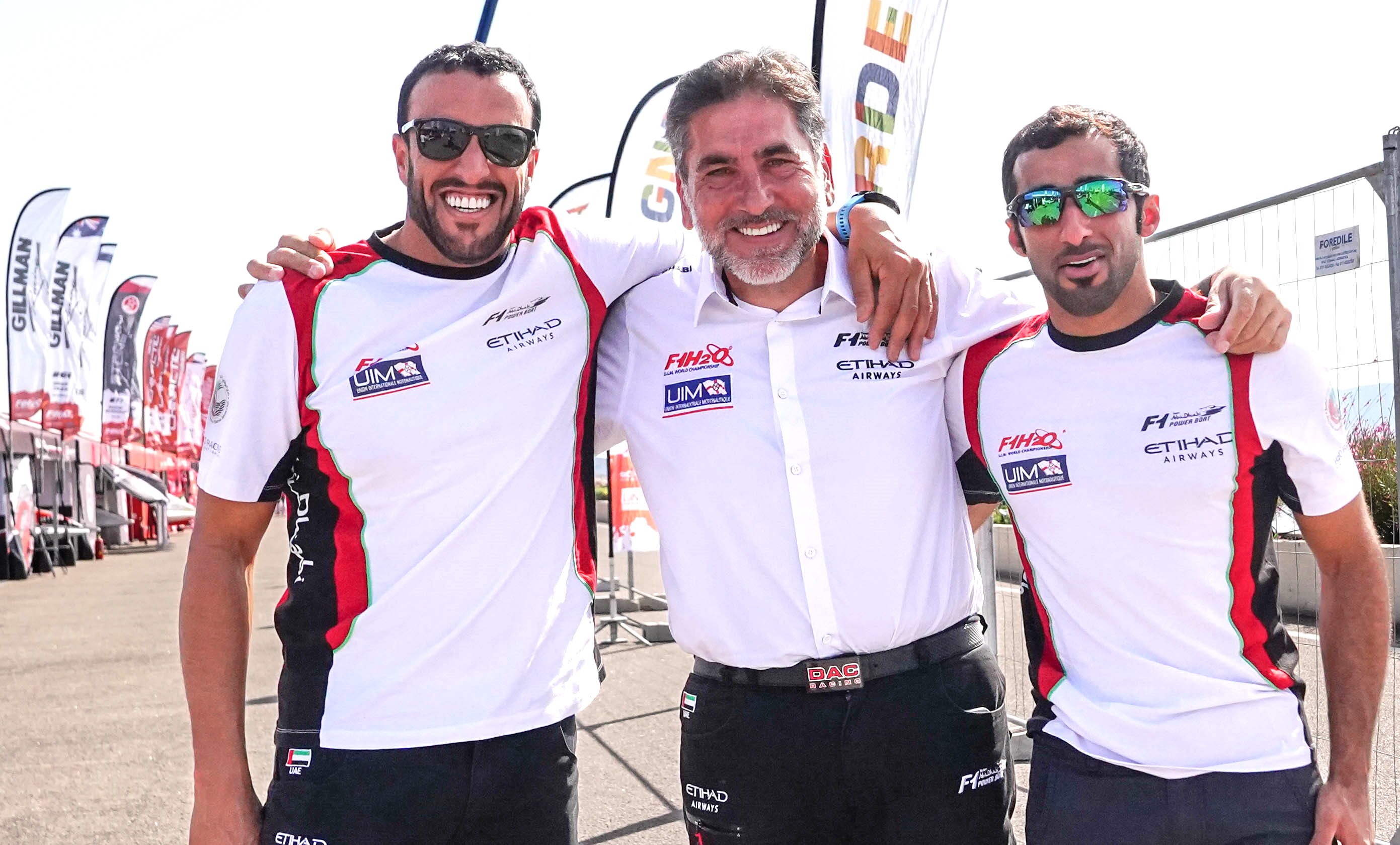 Thani Al-Qemzi (left) with Team Abu Dhabi manager Guido Cappelini and team-mate and cousin Rashed Al-Qemzi. (Team Abu Dhabi)