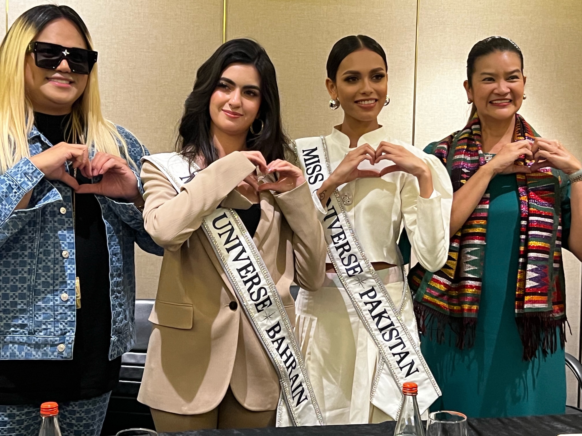 Miss Universe Bahrain Lujane Yacoub and Miss Universe Pakistan Erica Robin, middle, poses for a photo after meeting reporters in Manila, Philippines on Sept. 30, 2023. (AN Photo)