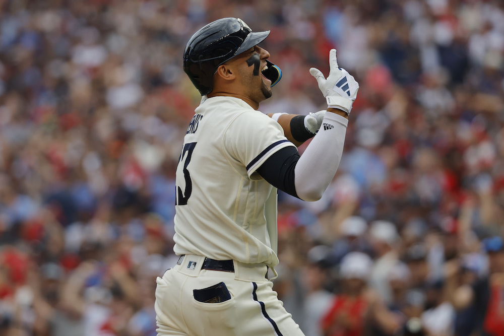 Minnesota Twins’ Royce Lewis celebrates as he reaches home plate after a solo home run during the third inning in Game 1 of an AL wildcard baseball playoff series Tuesday in Minneapolis. (AP)