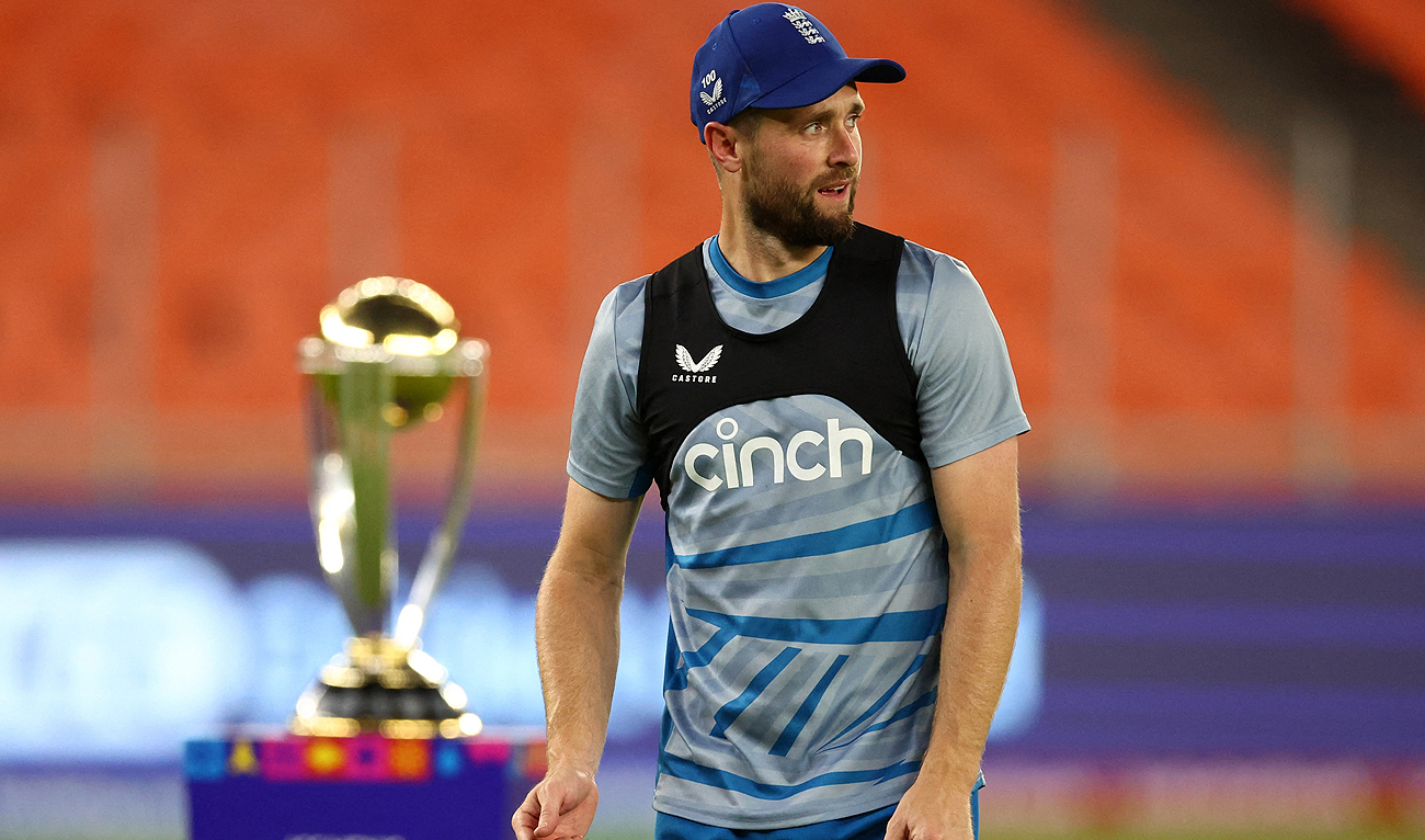 England's Chris Woakes gestures during a practice session at the Narendra Modi Stadium in Ahmedabad on October 4, 2023, ahead of the ICC Cricket World Cup 2023 opener between England and New Zealand. (REUTERS)