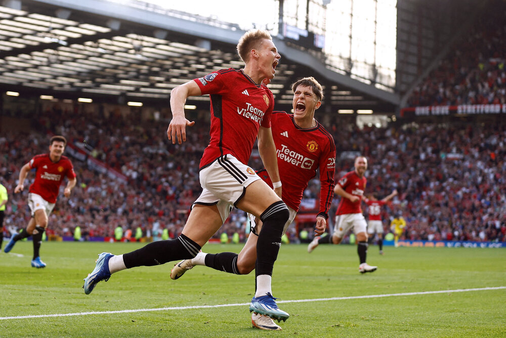Manchester United’s Scott McTominay celebrates scoring their second goal with Alejandro Garnacho during their Premier League match against Brentford at Old Trafford on Oct. 7, 2023. (Reuters)