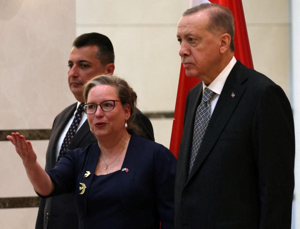Turkish President Recep Tayyip Erdogan (R) speaks with Israel's Ambassador to Ankara İrit Lillian (C) as he receives the letter of credence, at the Presidential Complex in Ankara, on December 27, 2022. (File/AFP)