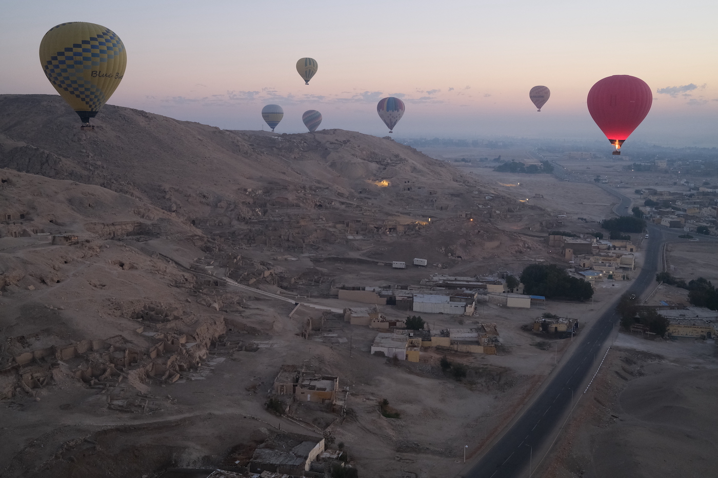 Tourists enjoy stunning views of Luxor on hot air balloon rides