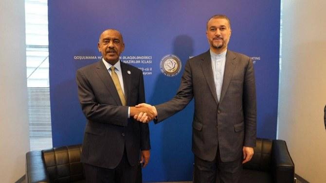 Iranian Foreign Minister Hossein Amirabdollahian shakes hands with Sudan’s acting Foreign Minister, Ali Sadeq, in Baku. (File/@IRIMFA_EN)
