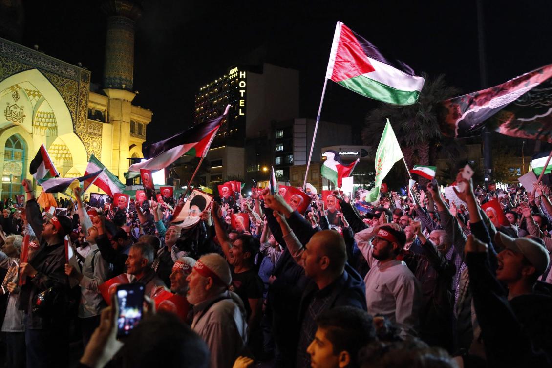 Iranians attend a gathering in Tehran on October 7, 2023, to express their solidarity with Palestine after Hamas militants launched a deadly air, land and sea assault into Israel from the Gaza Strip. (AFP)