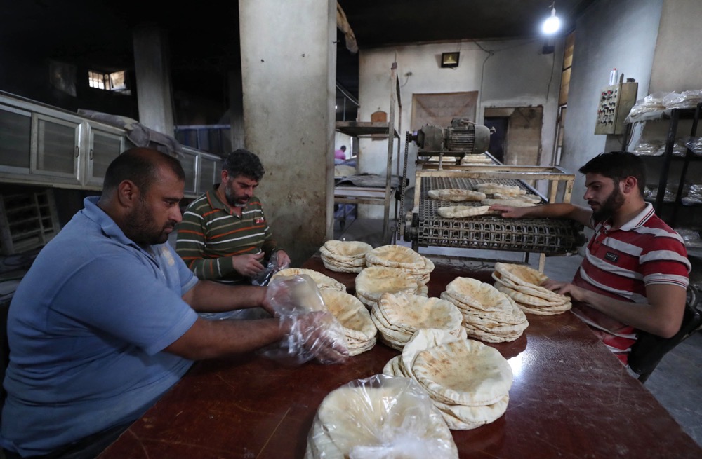 Russia’s withdrawal from the Black Sea Grain Initiative in July has led to fears of wheat shortages on the global market, causing prices for food staples like bread to skyrocket in import-reliant countries like Syria. (AFP)