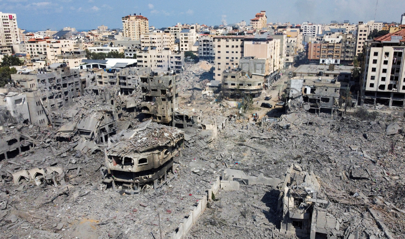 A view shows houses and buildings destroyed by Israeli strikes in Gaza City, October 10, 2023. (Reuters)