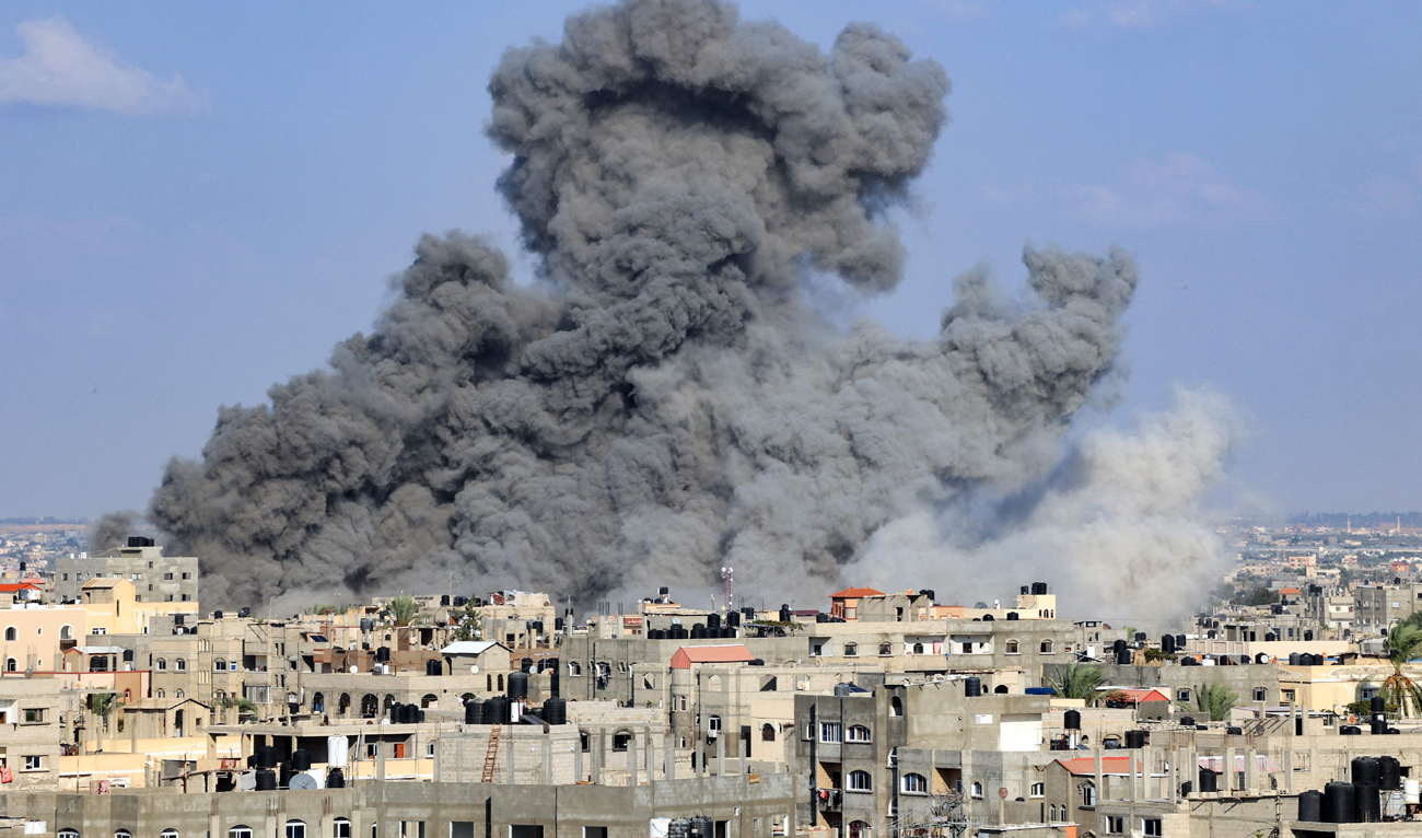 Smoke billows during an Israeli air strike in Rafah in the southern Gaza Strip on October 11, 2023. (AFP)