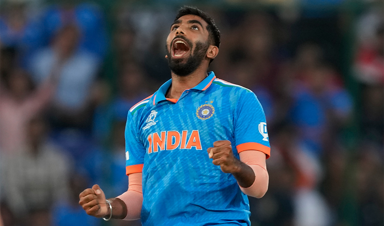 India's Jasprit Bumrah celebrates the wicket of Afghanistan's Mohammad Nabi during the ICC Men's Cricket World Cup match between Afghanistan and India in New Delhi, India, on October 11, 2023. (AP)