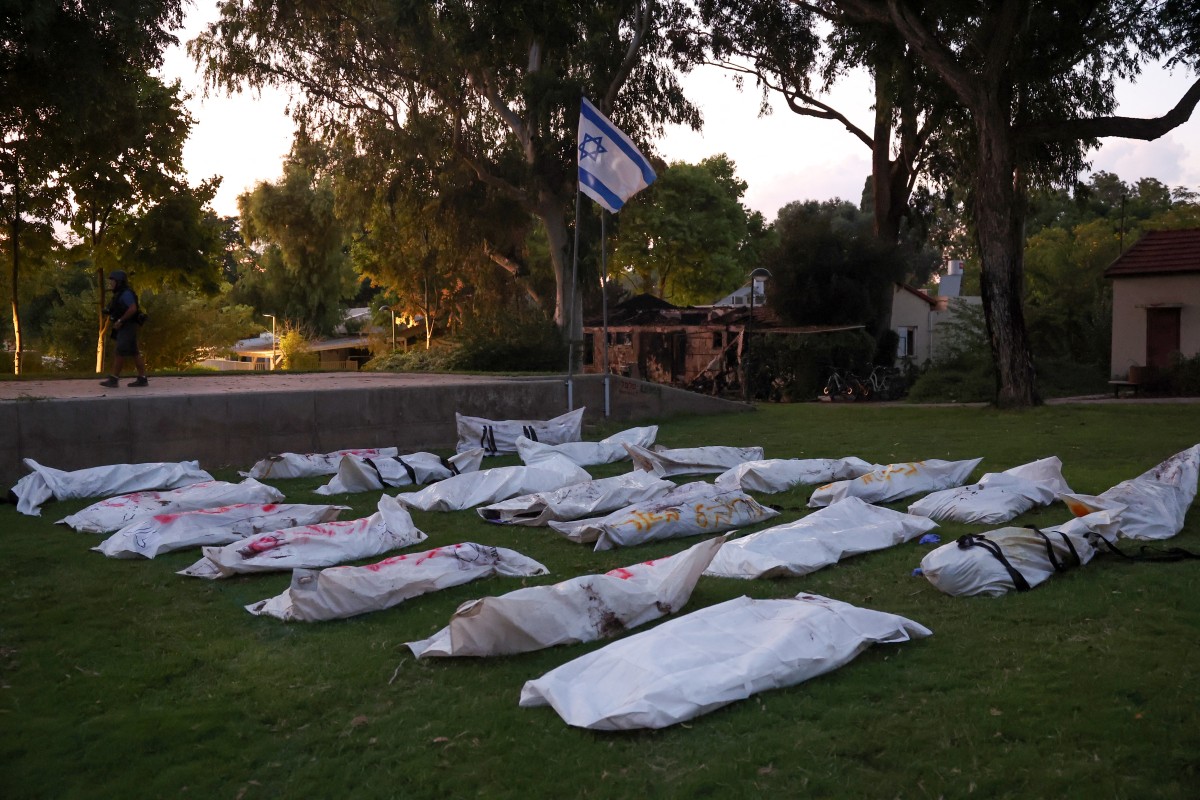 The death toll from five days of ferocious fighting between Hamas and Israel rose sharply overnight as Israel kept up its bombardment of Gaza after recovering the dead from the last communities near the border where Palestinian militants had been holed up (AFP)