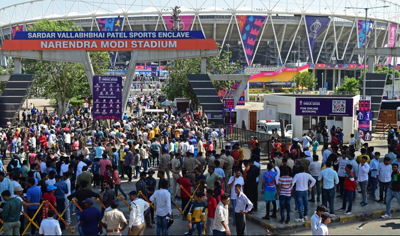 Fans arrive to watch the opening match of the 2023 Cricket World Cup between England and New Zealand at the Narendra Modi Stadium in Ahmedabad on October 5, 2023. (AFP)