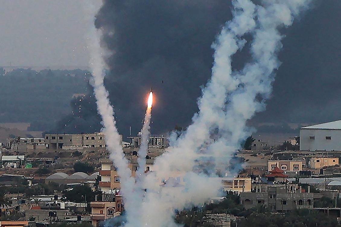 Palestinian militants fire rockets toward Israel from Rafah, southern Gaza Strip, on Oct. 11, 2023. (AFP)
