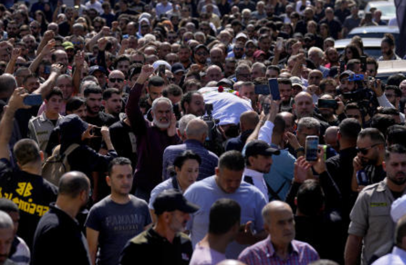A Reuters videographer killed in southern Lebanon by Israeli shelling is laid to rest