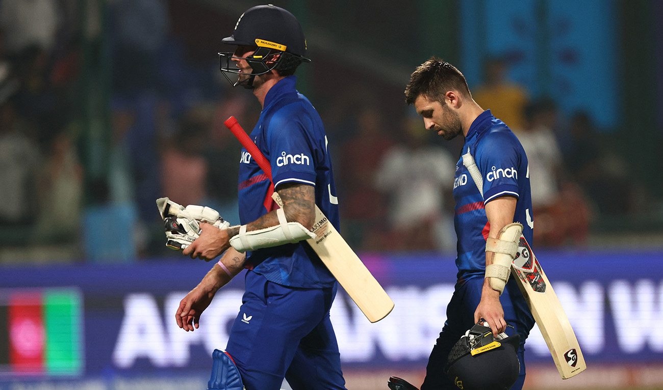 England's Mark Wood and Reece Topley look dejected after the match at the Arun Jaitley Stadium, New Delhi, India on October 15, 2023. (REUTERS)