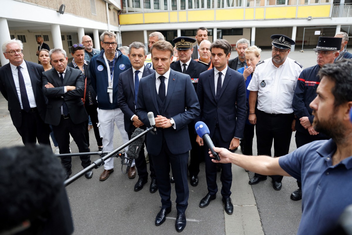 Macron calls for ‘ruthless’ government response after teacher killed