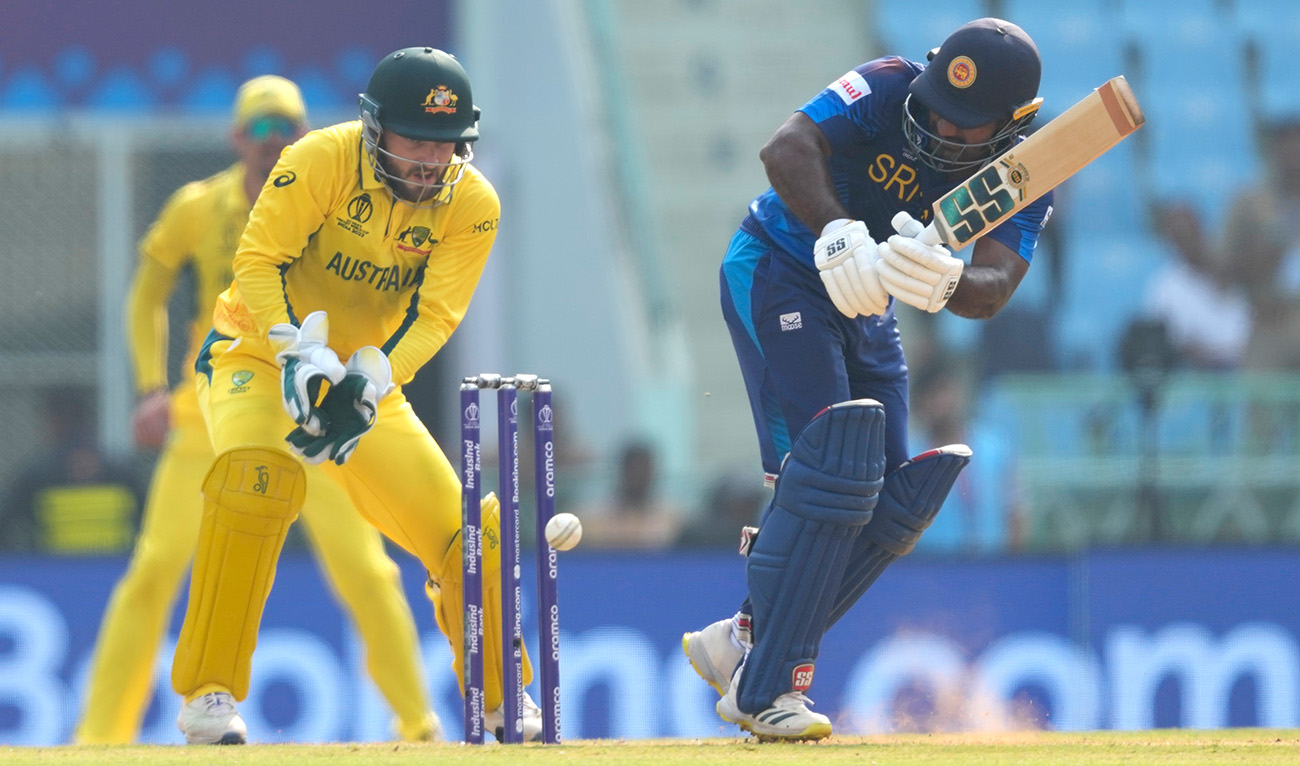 Sri Lanka's Kusal Perera plays a shot during the ICC Men's Cricket World Cup match between Australia and Sri Lanka in Lucknow, India, Monday, Oct. 16, 2023. (AP)