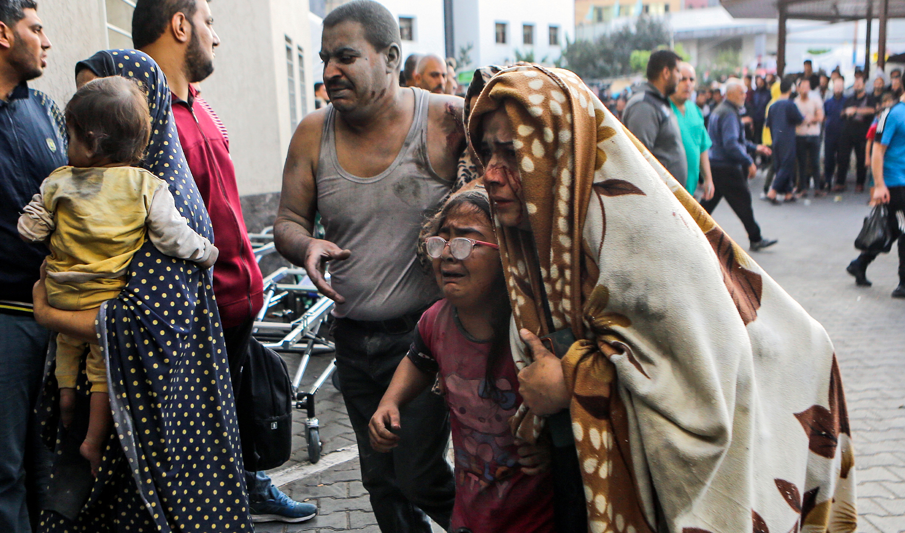 Wounded Palestinians arrive to al-Shifa hospital, following Israeli airstrikes on Gaza City, central Gaza Strip, on October 16, 2023. (AP)