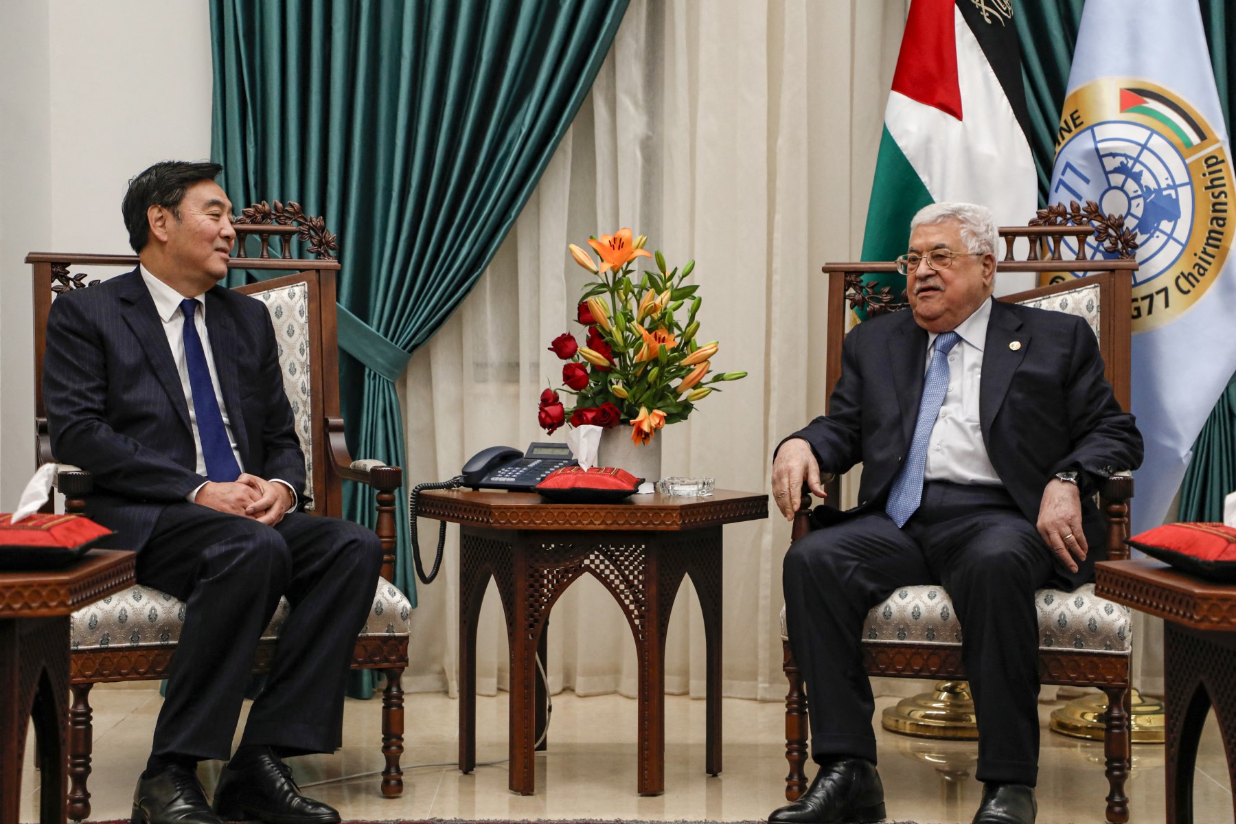 File photo of Chinese envoy Zhai Jun with Palestinian president Mahmoud Abbas (AFP)