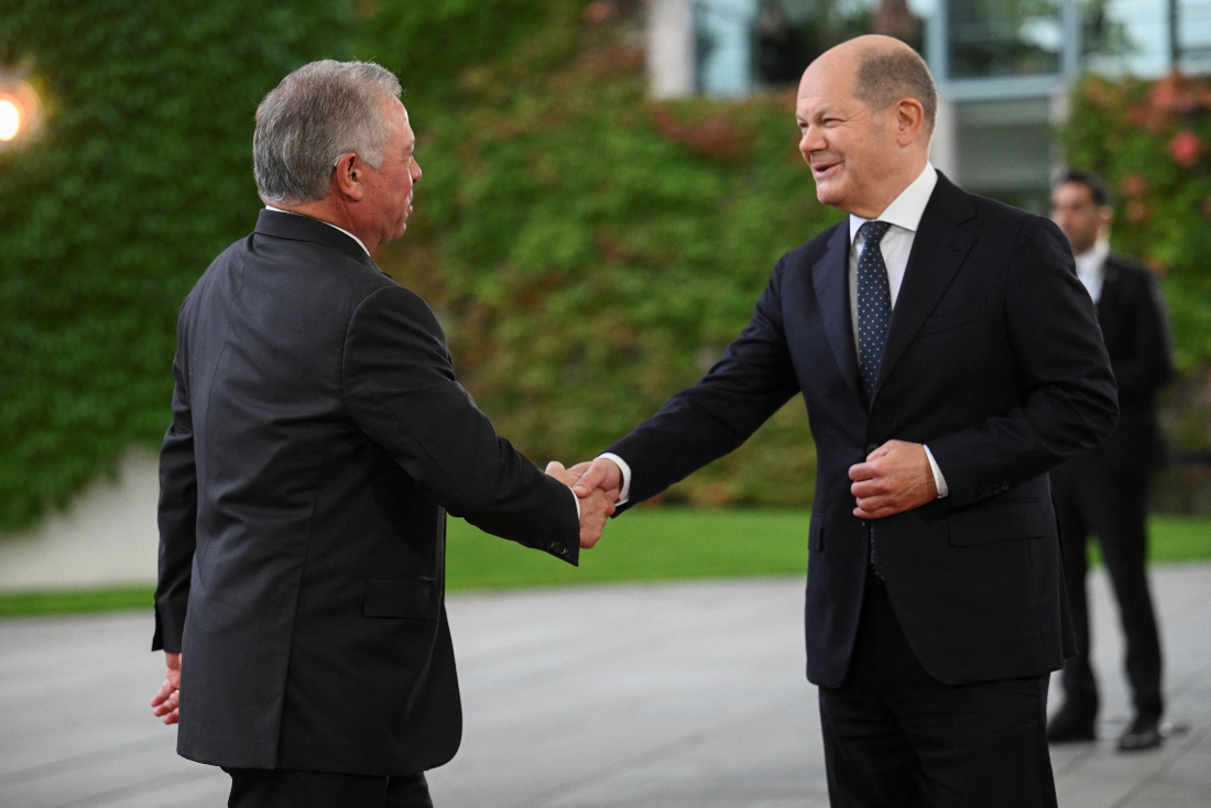 King Abdullah, during a meeting with German Chancellor Olaf Scholz in Berlin, warned against pushing Egypt and Jordan to accept Palestinian refugees from Gaza. (AFP)