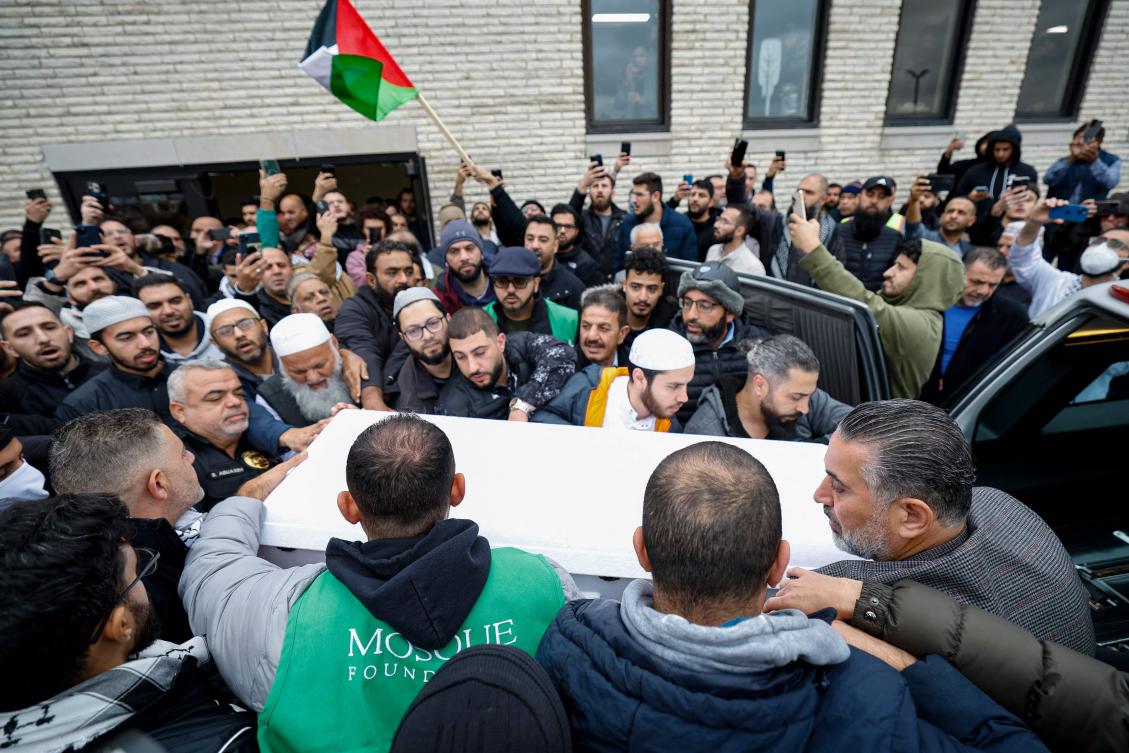 Mourners carry the coffin of six-year-old Wadea Al-Fayoume after a funeral service at the Mosque Foundation on October 16, 2023 in Bridgeview, Illinois. Wadea was stabbed to death and his mother seriously injured in an attack by the family’s landlord, Joseph Czuba, motivated by hatred for Muslims. (AFP)