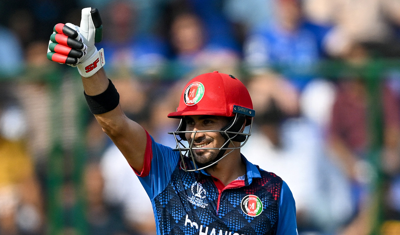 Afghanistan's Rahmanullah Gurbaz celebrates after scoring a half-century (50 runs) during the 2023 ICC Men's Cricket World Cup one-day international (ODI) match between England and Afghanistan at the Arun Jaitley Stadium in New Delhi on October 15, 2023. (AFP)