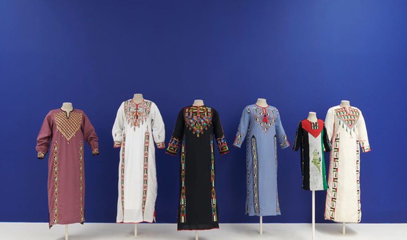 The undated photo shows traditional Palestinian dresses exhibited at Kettle’s Yard, University of Cambridge, England. (Photo courtesy: Jo Underhill)