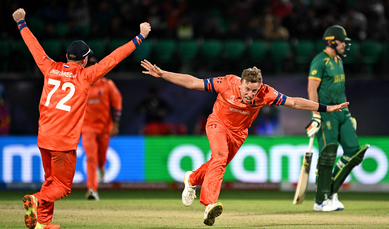 Netherlands' Logan van Beek (C) celebrates after taking the wicket of South Africa's David Miller (R) during the 2023 ICC Men's Cricket World Cup one-day international (ODI) match between South Africa and Netherlands at the Himachal Pradesh Cricket Association Stadium in Dharamsala on October 17, 2023. (AFP)