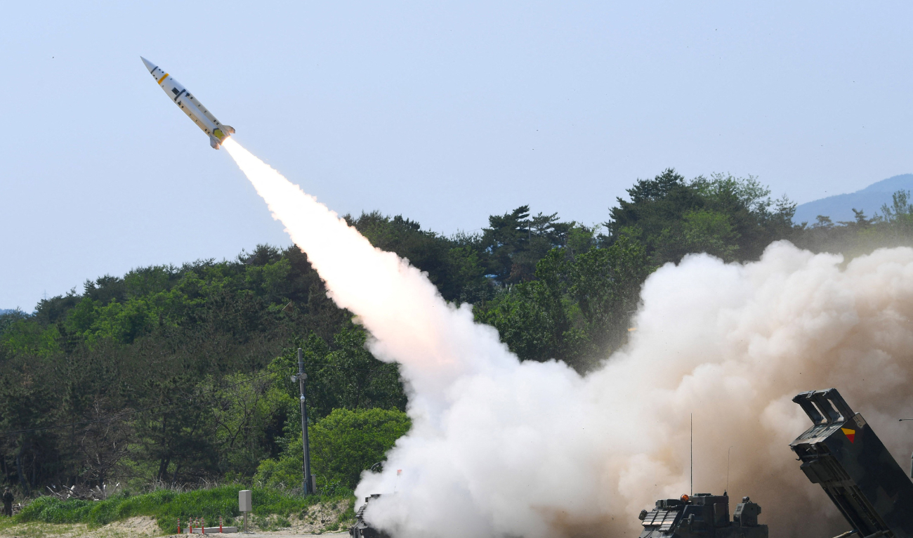 A US Army Tactical Missile System (ATACMS) firing a missile from an undisclosed location on South Korea’s east coast during a live-fire exercise on May 25, 2022. (AFP/File)