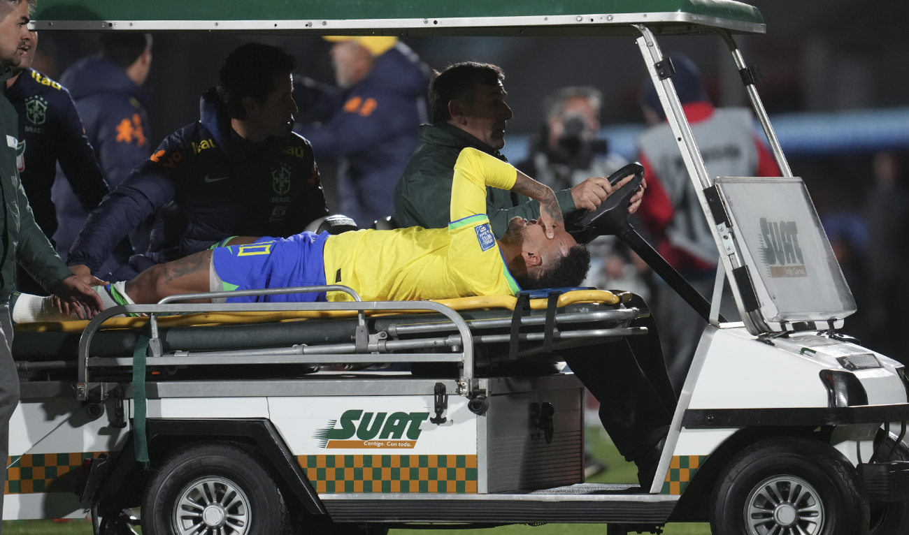 Neymar leaves Brazil match in tears with apparent left knee injury